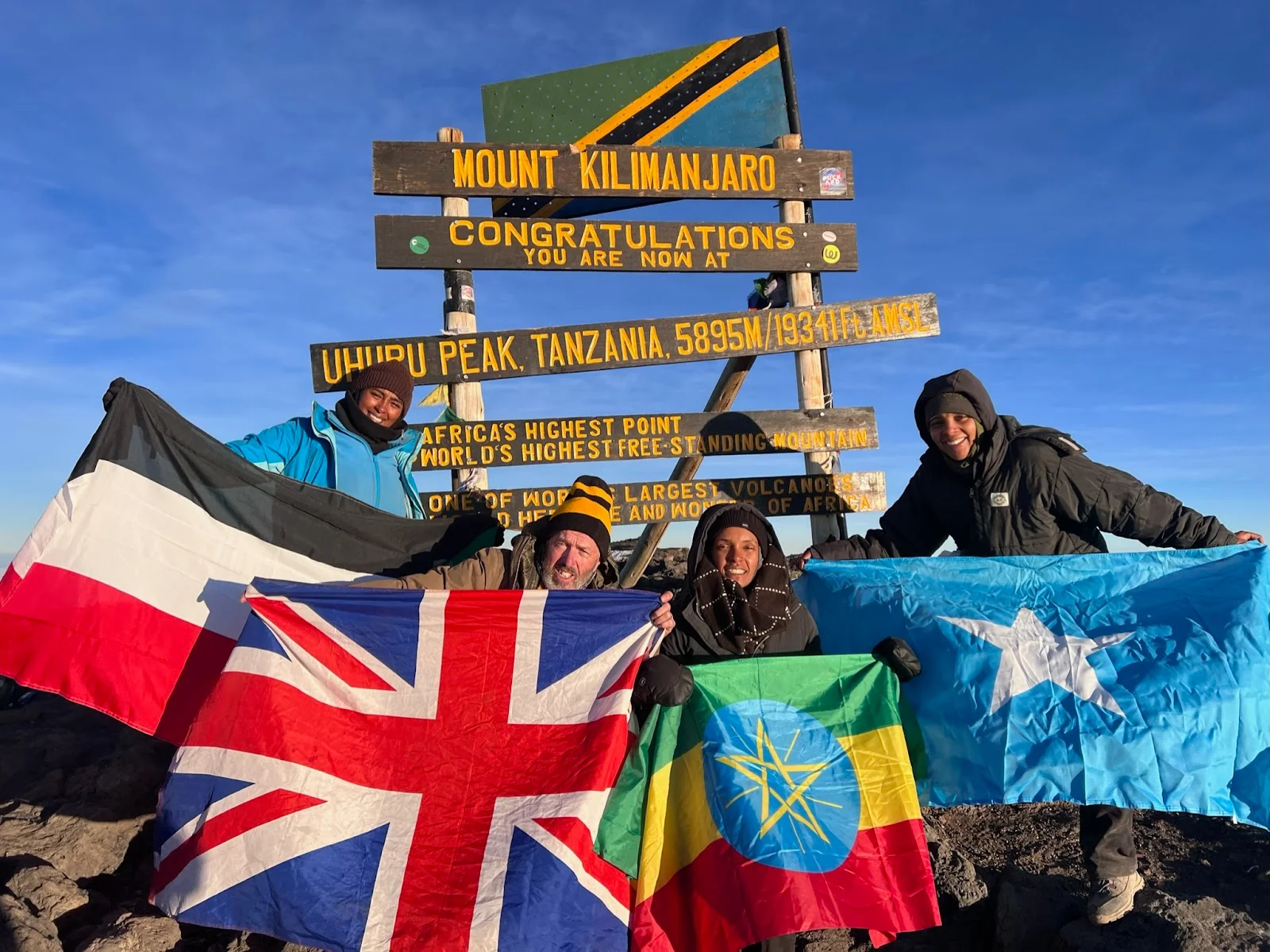 Amani Tours am Uhuru Peak, Kilimanjaro